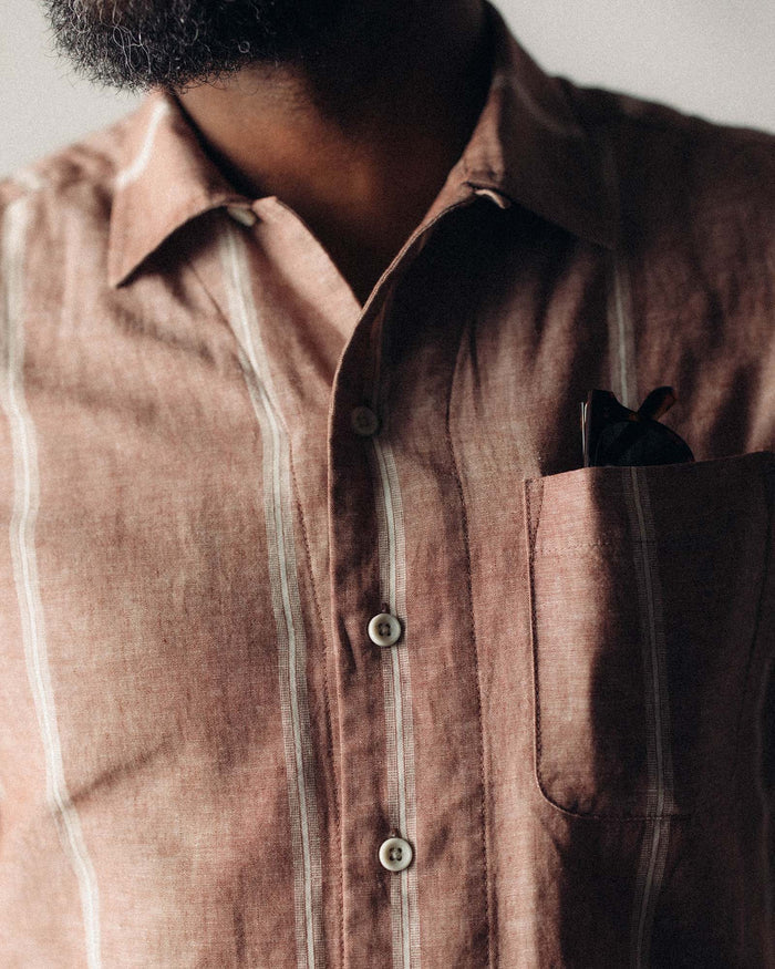 fit model posing in The Short Sleeve Hawthorne in Dried Fig Stripe