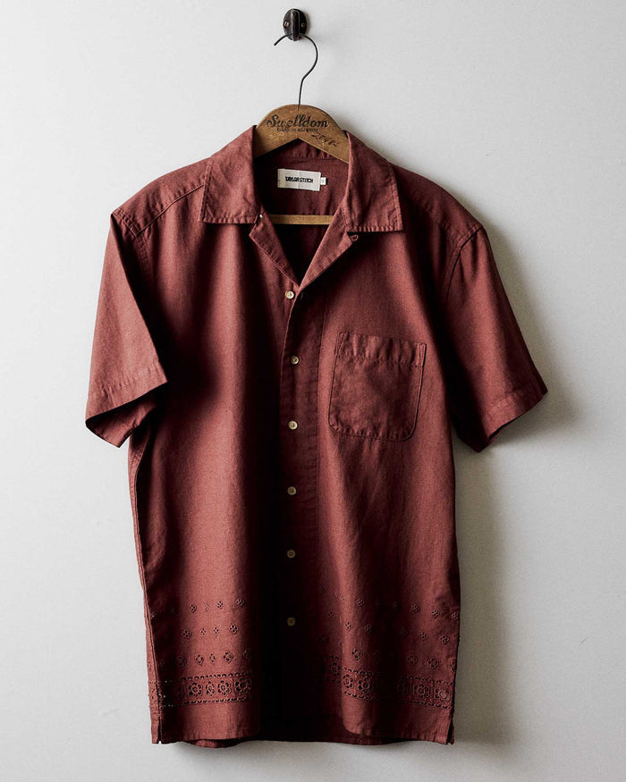 editorial image of The Hawthorne Shirt in Red Wine Border Eyelet hanging