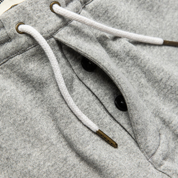 material shot of hidden button fly of The Heavy Bag Short in Heather Grey Fleece