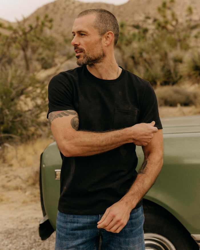 fit model posing in The Heavy Bag Tee in Black