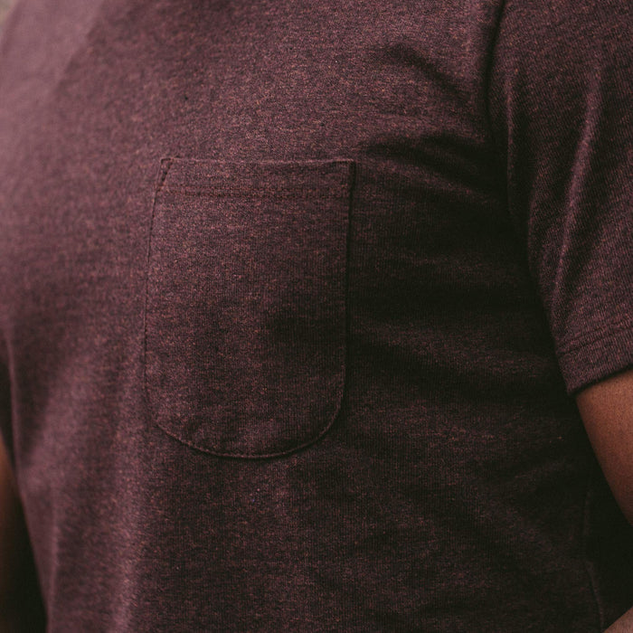 The fit model showing a close up of the Heavy Bag tee