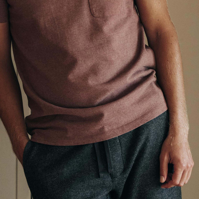 fit model showing bottom detail on The Heavy Bag Tee in Burgundy
