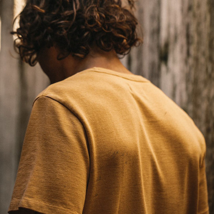 Our fit model wearing The Heavy Bag Tee in Canary.