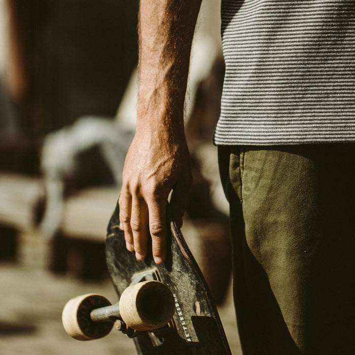 Our fit model wearing The Heavy Bag Tee in Grey Stripe.