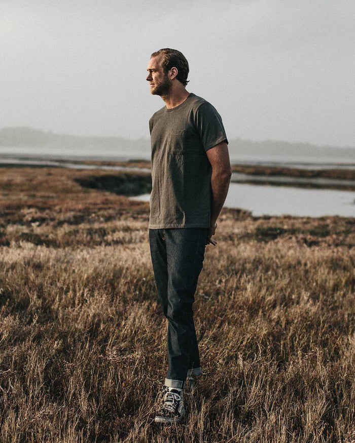 Our fit model wearing The Heavy Bag Tee in Heather Grey from Taylor Stitch.