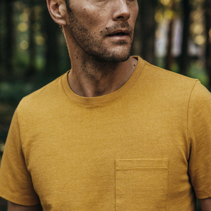 fit model showing pocket detail on The Heavy Bag Tee in Honey