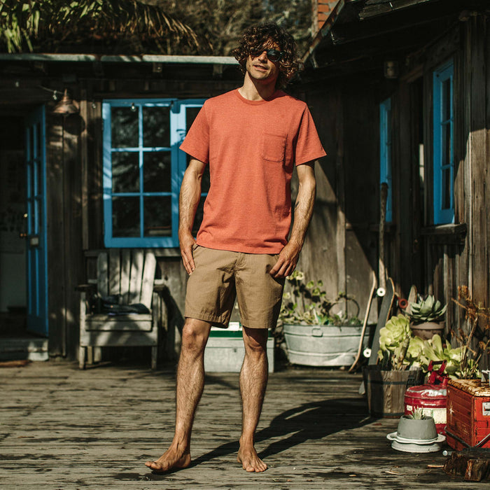 Our fit model wearing The Heavy Bag Tee in Washed Rust.