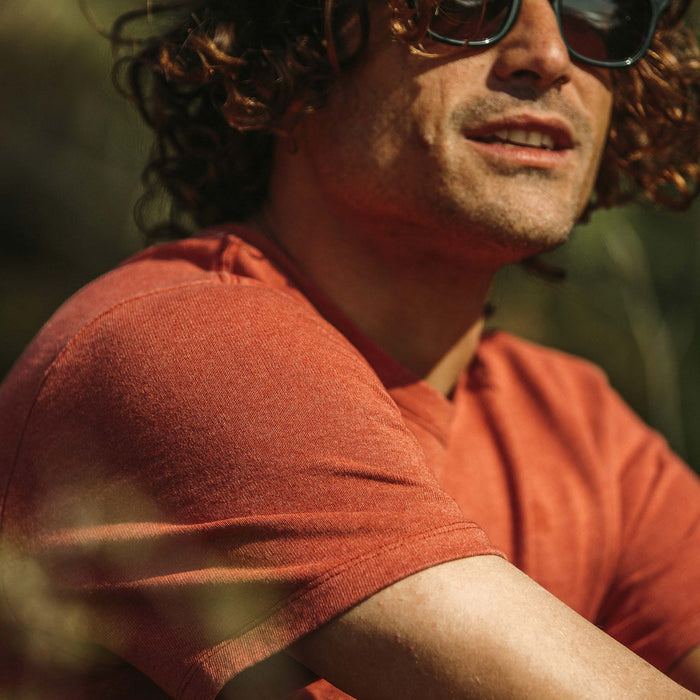 Our fit model wearing The Heavy Bag Tee in Washed Rust.