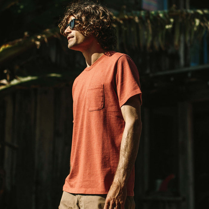 Our fit model wearing The Heavy Bag Tee in Washed Rust.