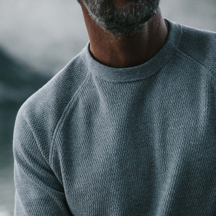 fit model showing close up of texture of The Heavy Bag Waffle Crewneck in Aluminum
