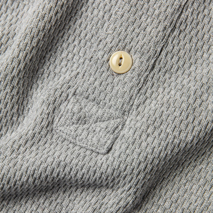 material shot of button