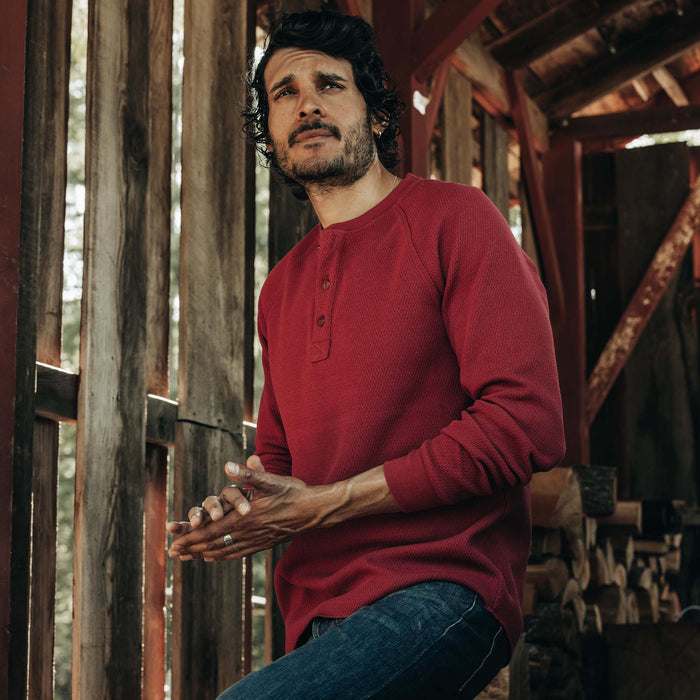fit model posing in The Heavy Bag Waffle Henley in Burgundy
