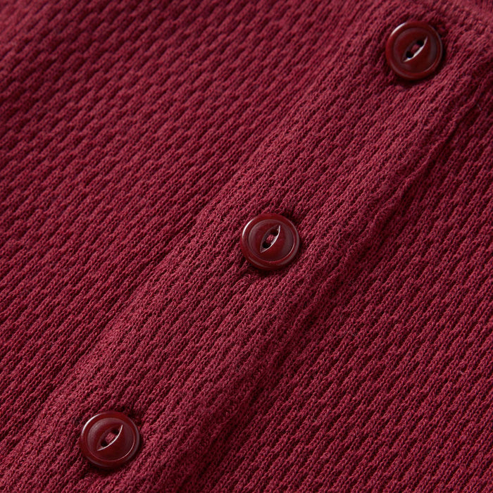 material shot of the buttons on The Heavy Bag Waffle Henley in Burgundy