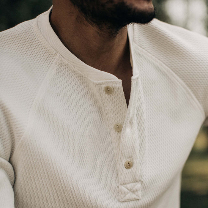 fit model with open collar of The Heavy Bag Waffle Henley in Natural