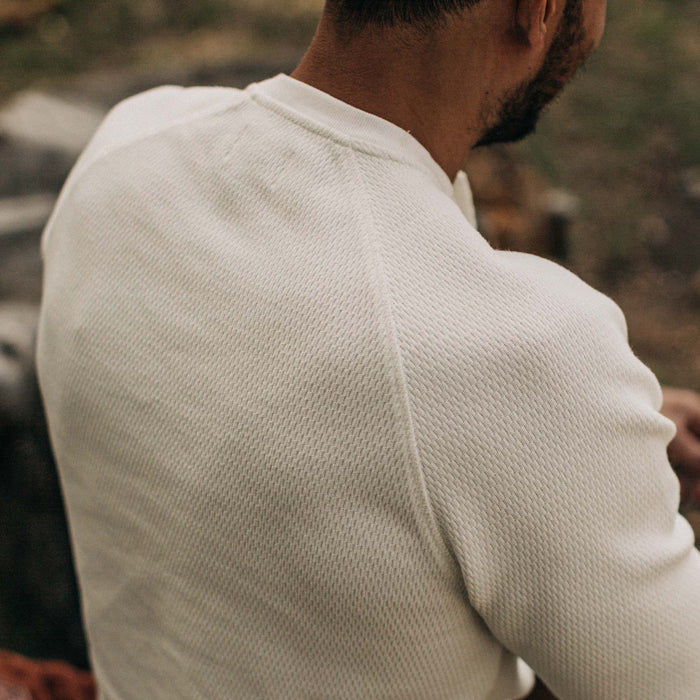 fit model showing back of The Heavy Bag Waffle Henley in Natural