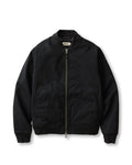 flatlay of The Insulated Bomber Jacket in Coal Dry Wax