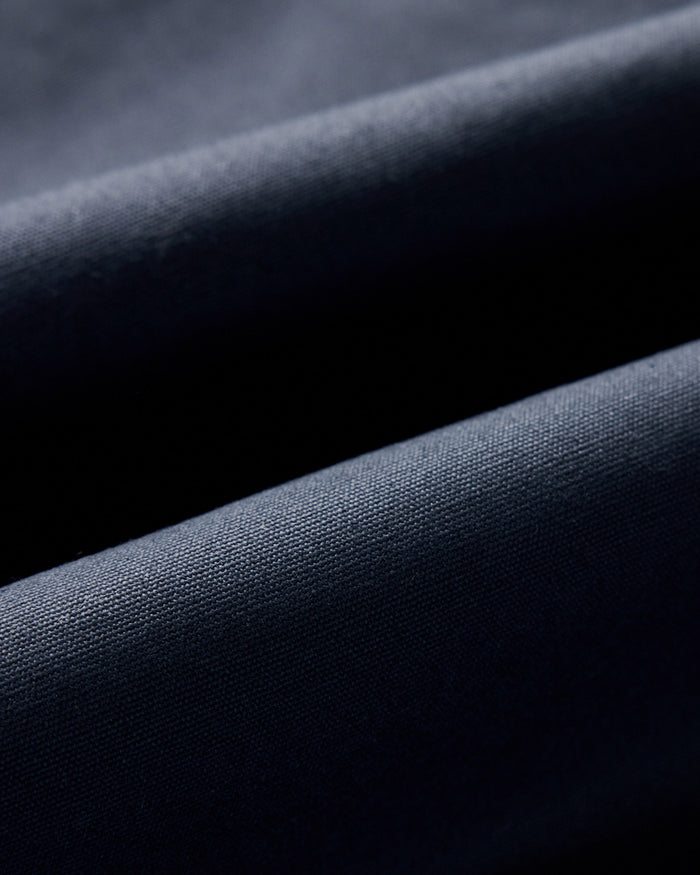material shot of the fabric on The Insulated Bomber Jacket in Dark Navy Dry Wax