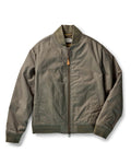 flatlay of The Insulated Bomber Jacket in Fatigue Olive Dry Wax