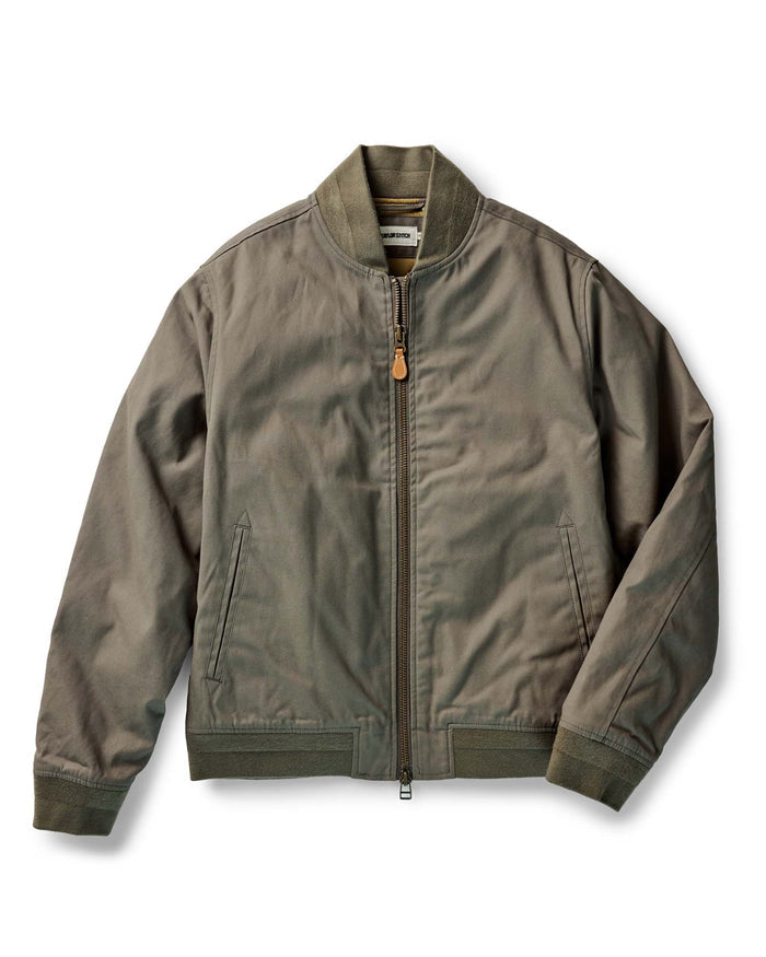 flatlay of The Insulated Bomber Jacket in Fatigue Olive Dry Wax