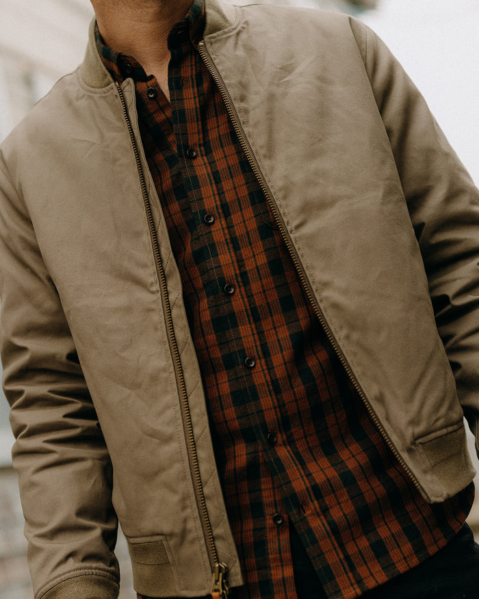 fit model showing the zipper front of The Insulated Bomber Jacket in Fatigue Olive Dry Wax