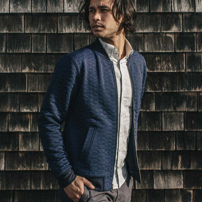 Our fit model wearing The Inverness Bomber in Navy Knit Quilt.