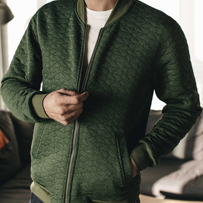 Our fit model wearing The Inverness Bomber in Olive Knit Quilt.