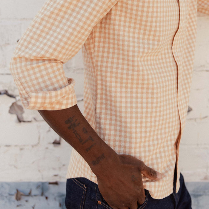 fit model with his hands in his pockets wearing The Jack in Baked Clay Check