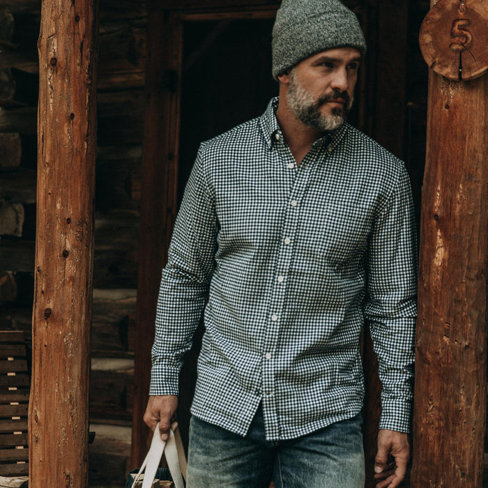 fit model wearing The Jack in Brushed Navy Gingham, holding tote