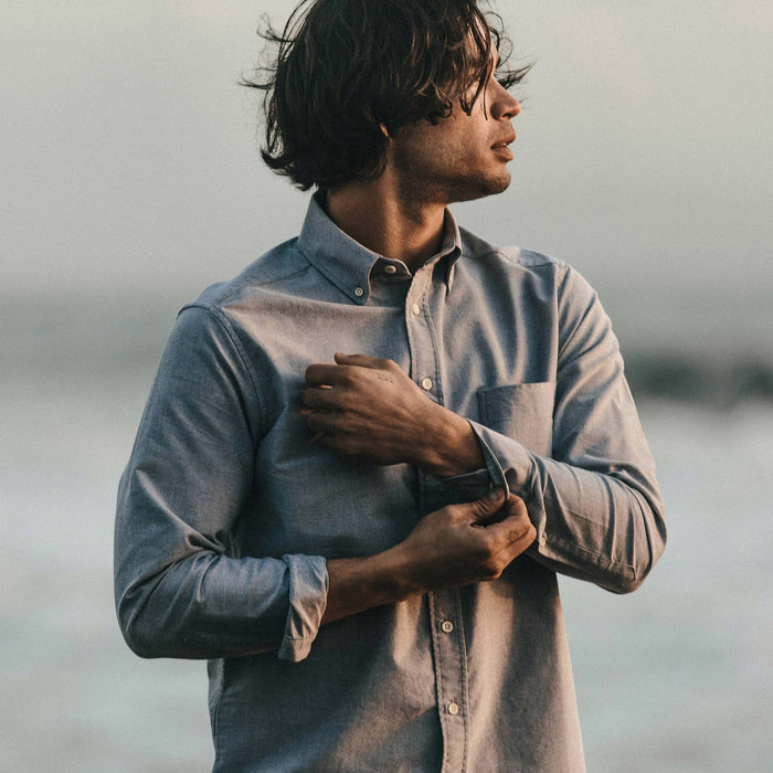 fit model adjusting the cuffs on The Jack in Charcoal Everyday Oxford