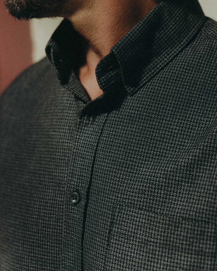 fit model showing off button details on The Jack in Coal Jaspe Check Oxford