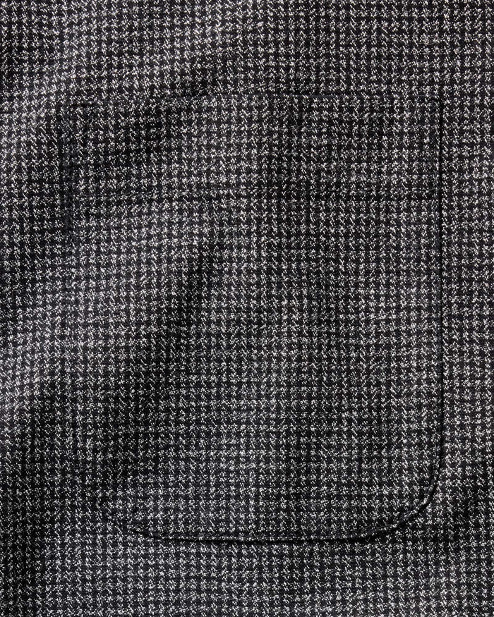 material shot of the back of the collar on The Jack in Coal Jaspe Check Oxford