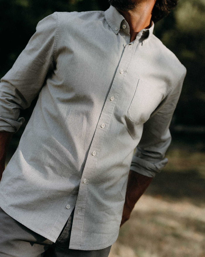 fit model showing off cuffs on The Jack in Coal Jaspe University Stripe Oxford