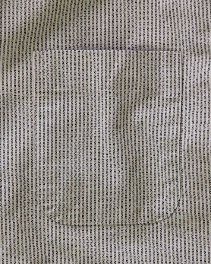 material shot of the button on the back collar of The Jack in Coal Jaspe University Stripe Oxford