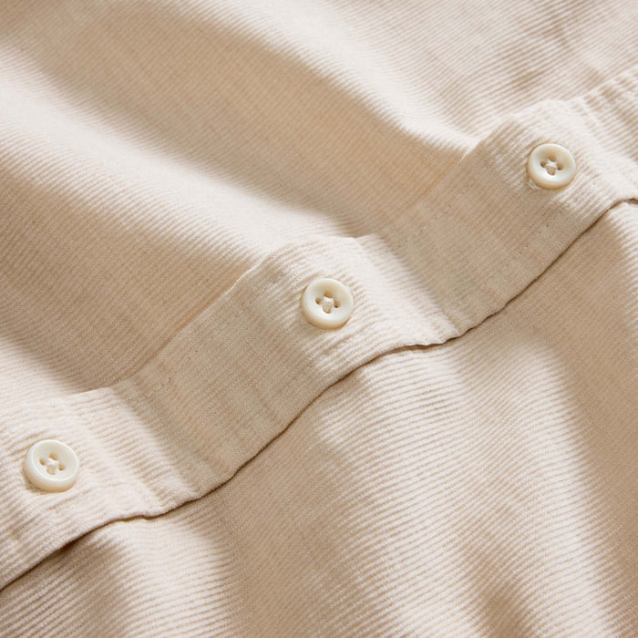 material shot of the buttons on The Jack in Oat Heathered Pincord