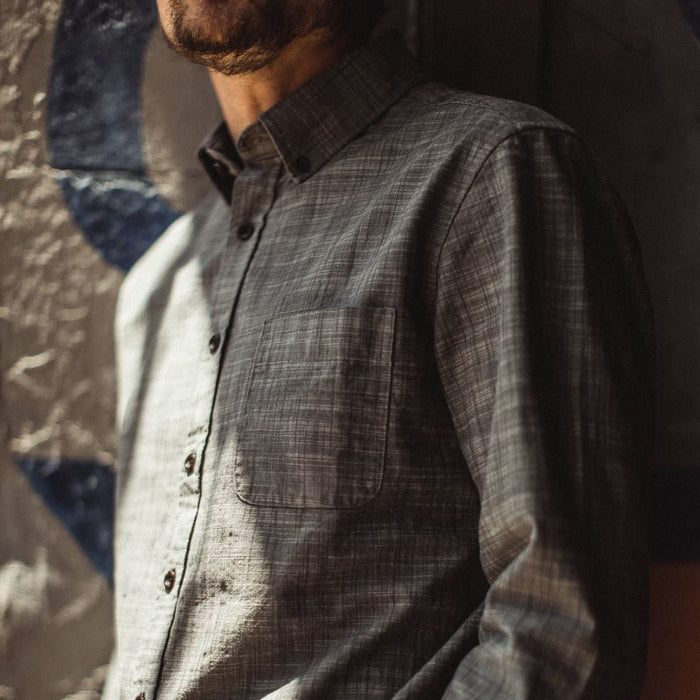 Our fit model wearing the Jack in Olive Pin Dot from Taylor Stitch.