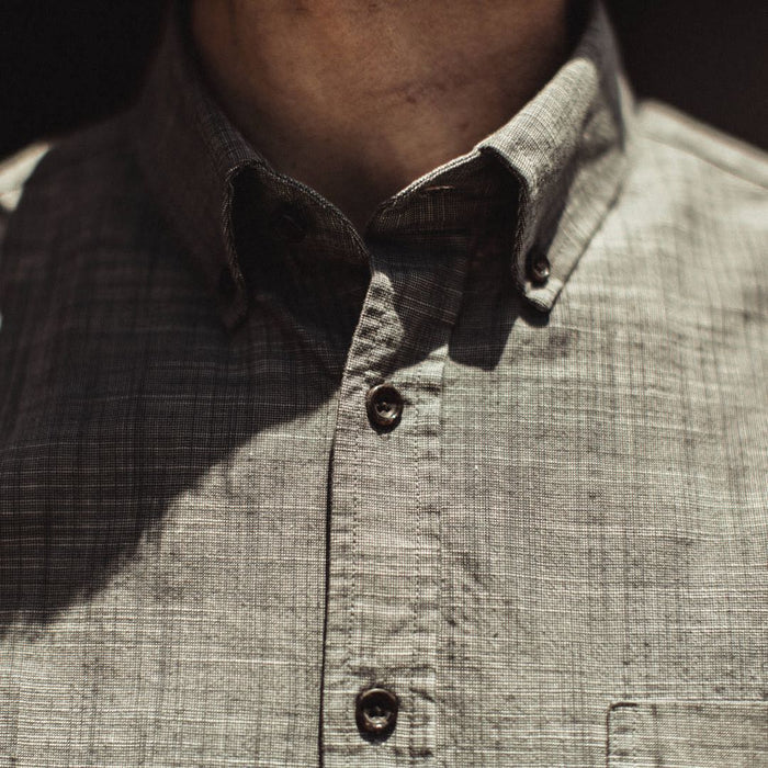 Our fit model wearing the Jack in Olive Pin Dot from Taylor Stitch.