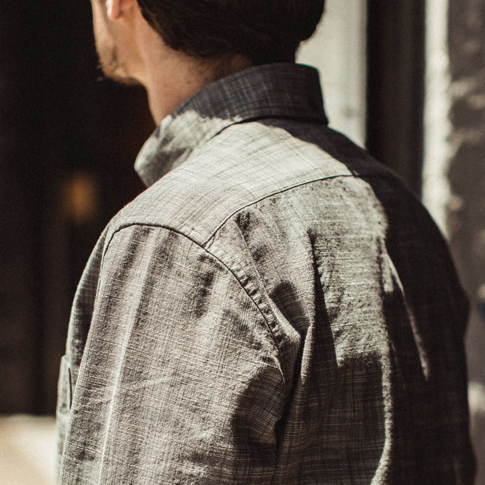 Our fit model wearing the Jack in Olive Pin Dot from Taylor Stitch.