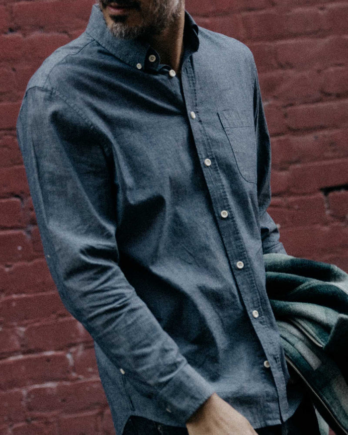 fit model with his hand in his pocket wearing The Jack in Rinsed Indigo Chambray