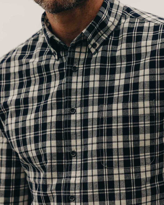 fit model showing off the buttons on The Jack in Rinsed Indigo Plaid