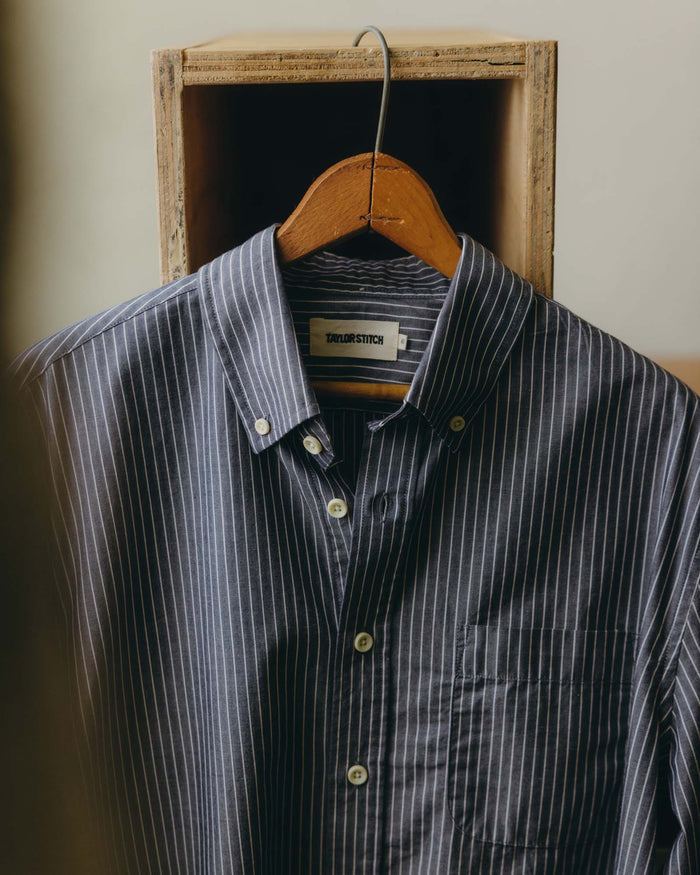 fit model with his hands in his pockets wearing The Jack in Rinsed Indigo Stripe