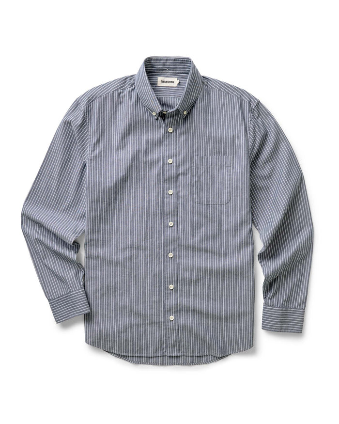 fit model with his arms crossed wearing The Jack in Rinsed Indigo Stripe