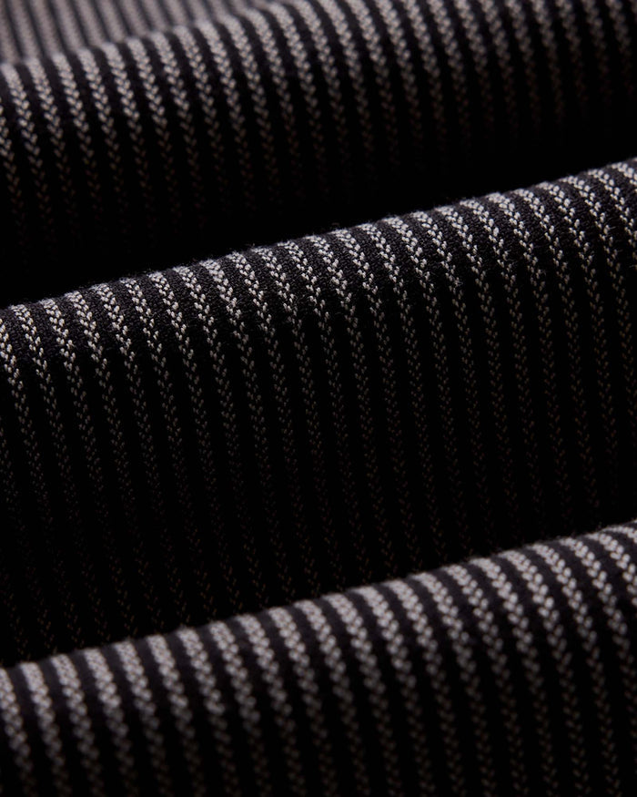 material shot of the back button on the collar on The Jack in Roped Black Indigo