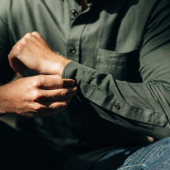 fit model fixing cuffs on The Jack in Spruce Houndstooth Check