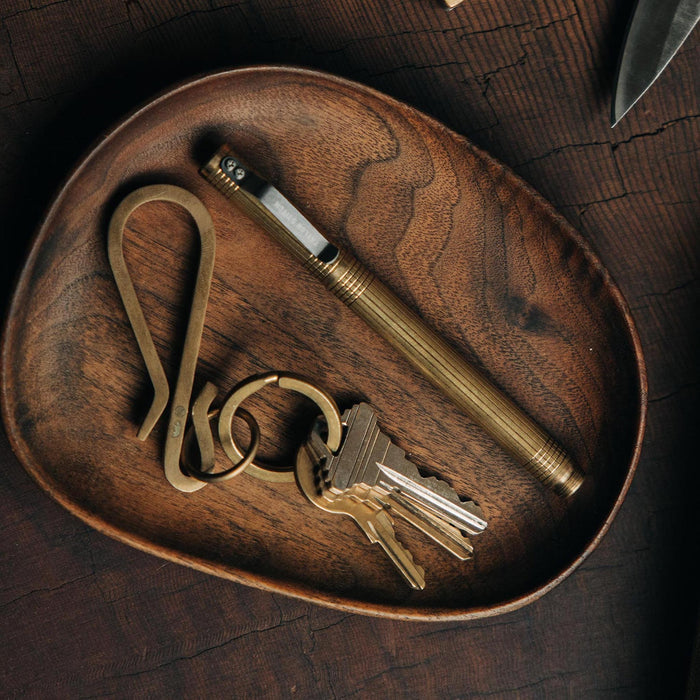 The Keyhook in Raw Brass on a tray