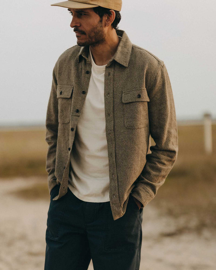 fit model posing in The Ledge Shirt in Army Linen Tweed