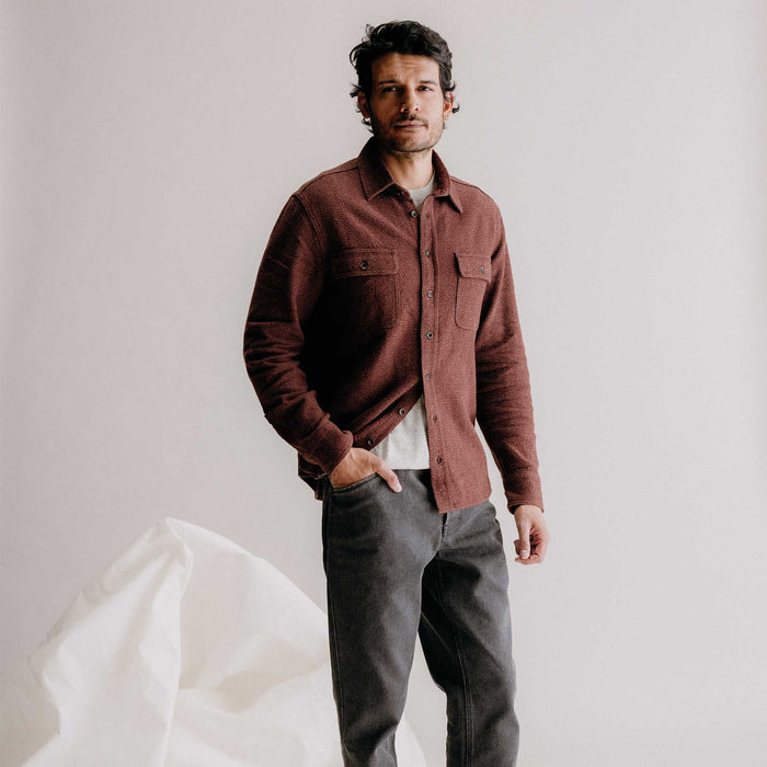 fit model posing in The Ledge Shirt in Burgundy Linen Tweed