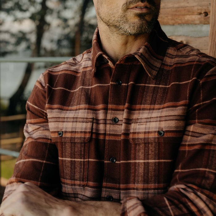 fit model posing in The Ledge Shirt in Chestnut Plaid
