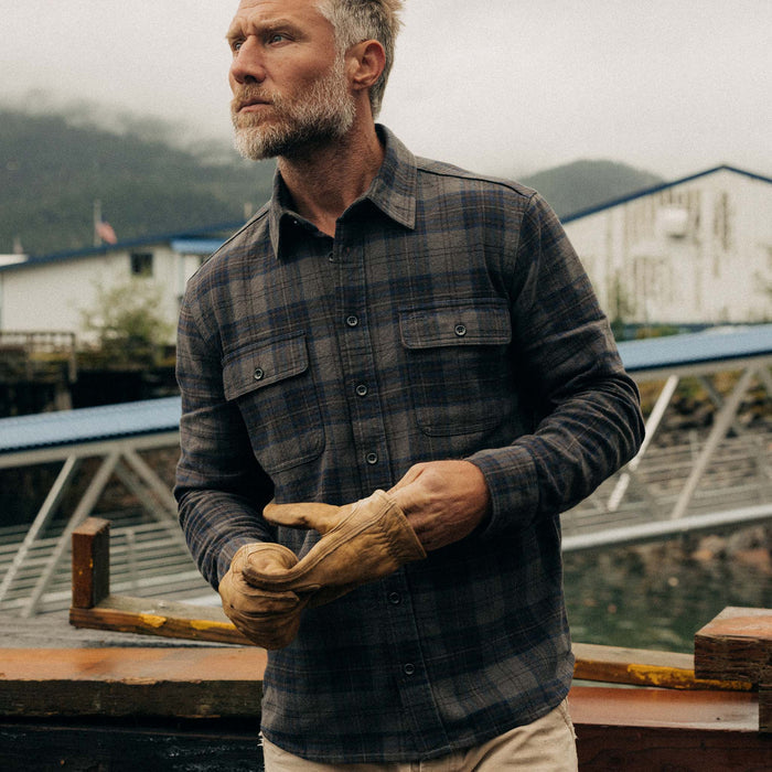 fit model posing in The Ledge Shirt in Heather Granite Plaid