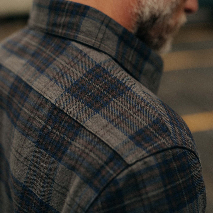 fit model showing off the shoulder on The Ledge Shirt in Heather Granite Plaid