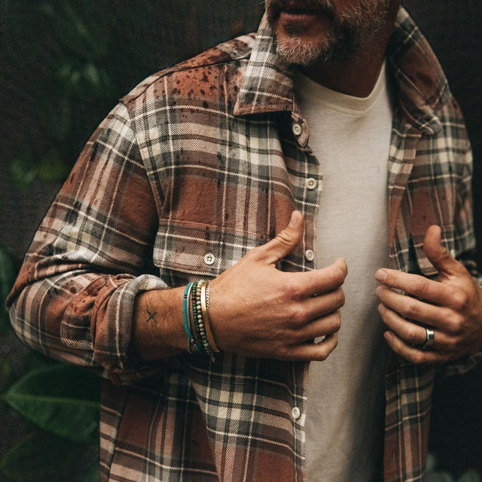 fit model showing the front of The Ledge Shirt in Sun Baked Brick Plaid